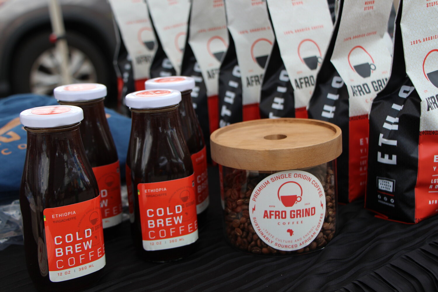 Omot Akway sells Afro Grind Coffee at the Soul of the Southside festival on Monday, June 19.