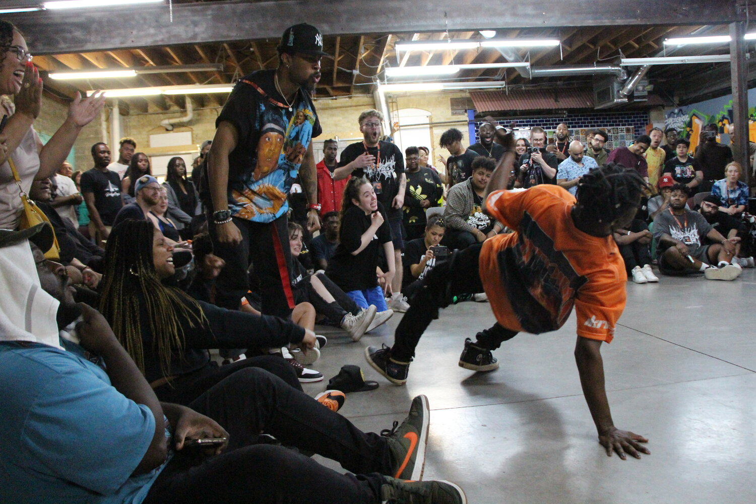 Dancer Simone Hall, aka Athena, dances in front of an audience during The Uprising krump battle on Saturday, June 10, 2023.