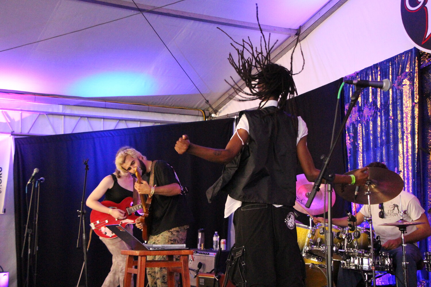 Artist Huhroon performs with a band on stage at Hook and Ladder on Monday, June 19 during the Soul of the Southside festival.