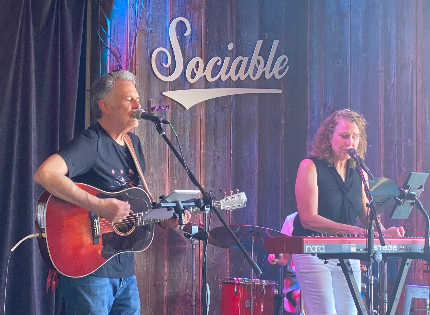 Scott Zosel (left) of Kingfield performs with Amy Finch on the keyboard during a show at Sociable CiderWerks.
