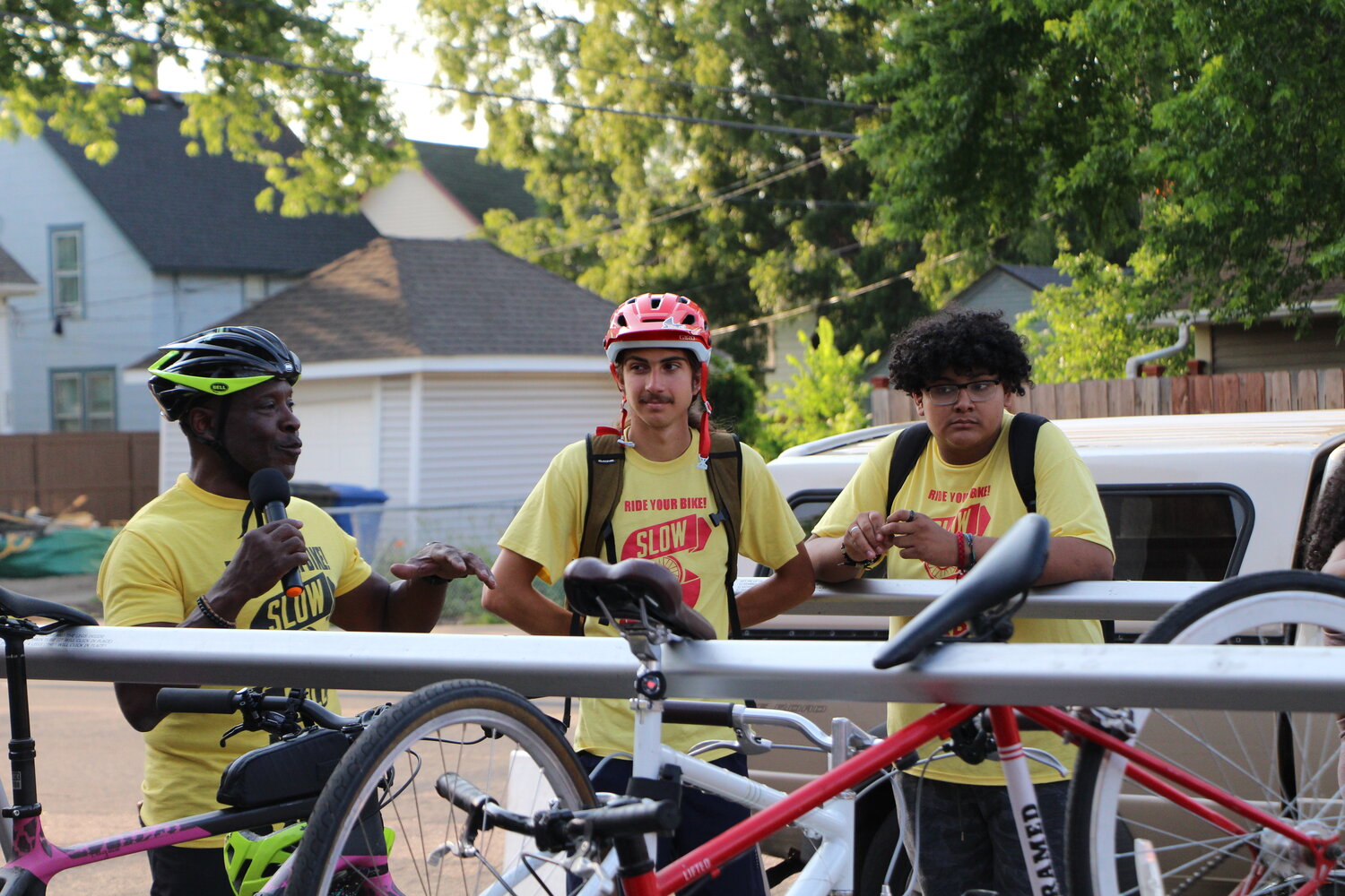 Anthony Taylor, Slow Roll members and team gather on 3rd Avenue in South Minneapolis in preparation for the Hotter than July Southside Late Solstice Roll on Thursday, June 29.