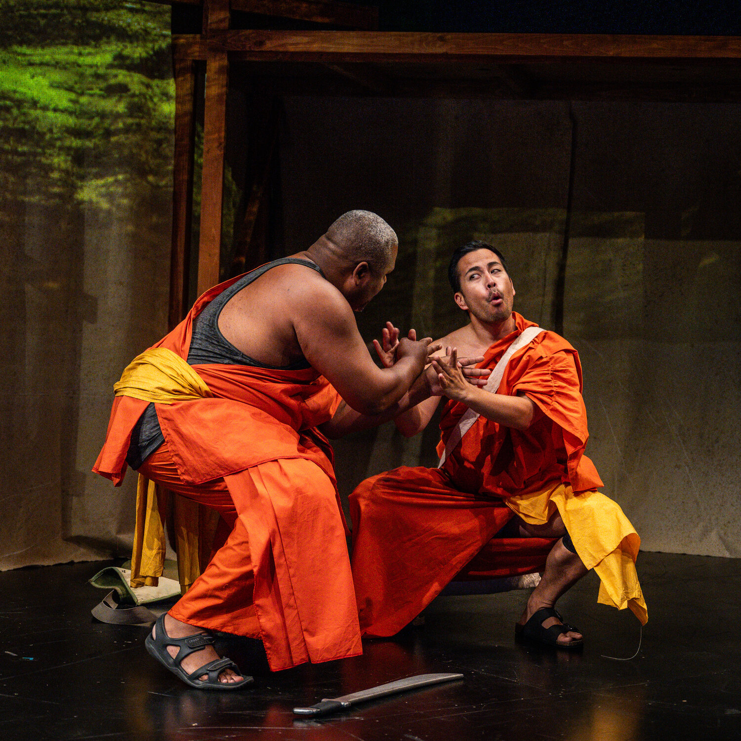 Payton J. Woodson (left) and  Norm Muñoz (right) perform in the “Kung Fu Zombies Saga: Shaman Warrior & Cannibals” at the Luminary Arts Center.