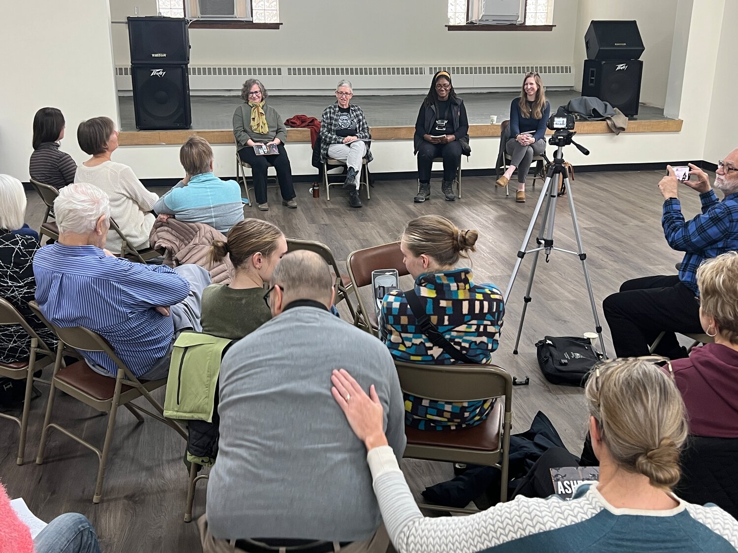 During a reading of her book “Ashes to Action: Finding Myself at the Intersection of the Minneapolis Uprising” at church in November, author Shari Seifert (second from left) and community members Susan Heineman, Marcia Howard and Katie Dillon talk about ways that Calvary Lutheran Church showed up for their neighbors at George Floyd Square during and following the uprising.