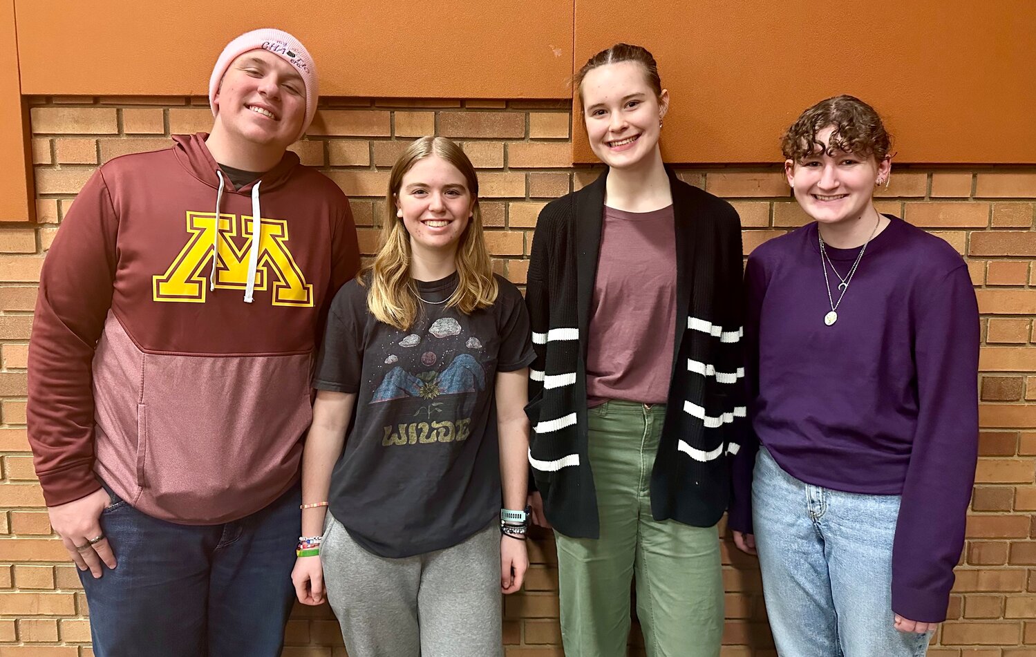 Tom Mickelson (coach), Ani McQuillen (state tournament competitor), Eleanor Nervig (state tournament competitor), and Adler Young (Roosevelt debater who attended to support and help prepare Ani and Eleanor for their debates). (Photo submitted)
