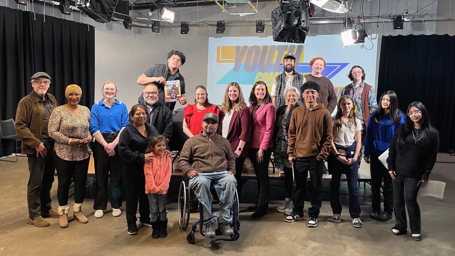Strong Mind Strong Body Foundation’s Youth Community Journalism Institute team with friends, family, and collaborators at St. Paul Neighborhood Network (SPNN) on March 10 after producing “Youth Community Journalism — Episode 9: Rebuilding Community in America.” (Photo by Eric Ortiz)