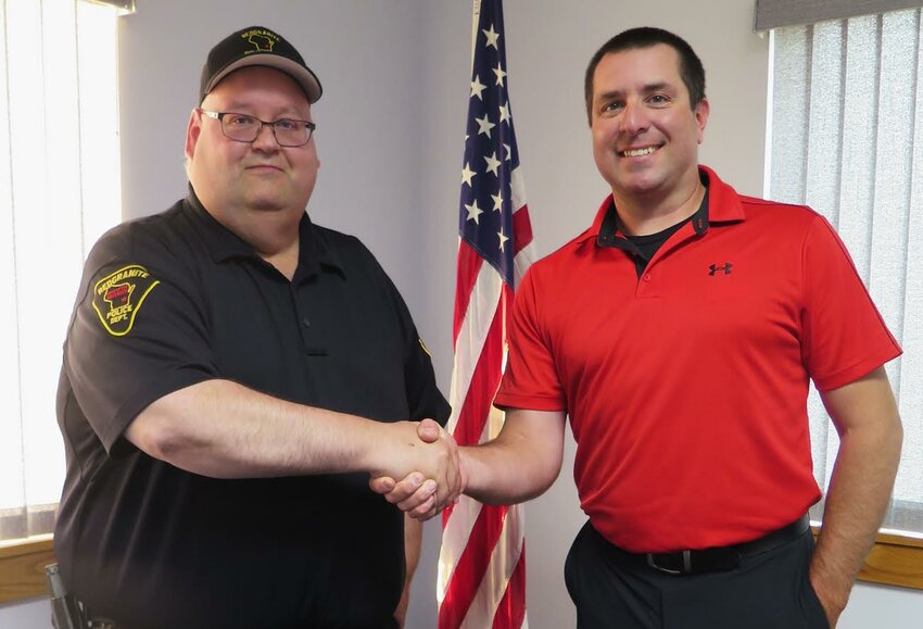 Following board approval, Police Chief Kyle Tarr welcomed new full-time police officer, Dustin Gessert.