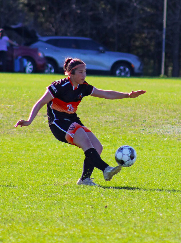 Brynlee Vaughan completes a quick free kick against Amherst on April 29.