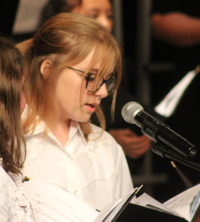 Shyloe Triechel, Mya Luna, and Makenna Buchholz sang solos during Thoughts of Home from Reflections of a Lad at Sea.