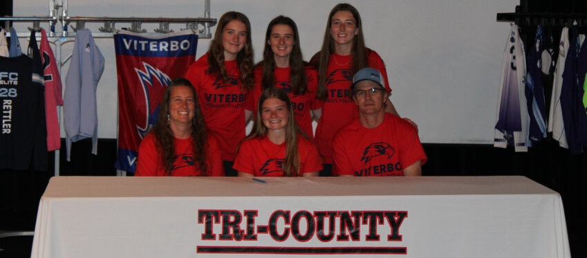 Tri-County High School senior Makenna Rettler has signed to play collegiate volleyball at Viterbo University. She will attend the La Crosse-based university with a $2,000 athletic scholarship. In addition to her athletic achievements, Rettler has been awarded $17,500 in academic scholarships for her outstanding performance at Tri-County. A quote that reflects Rettler’s mindset throughout her volleyball journey reads: “Volleyball is a game of errors, and those who persevere and are resilient will find the most success within the game and in life.” Pictured: Back row (from left): Elli Rettler, Karissa Rettler, Addyson Rettler. Front row: Jessica Rettler, Makenna Rettler, Matt Rettler.