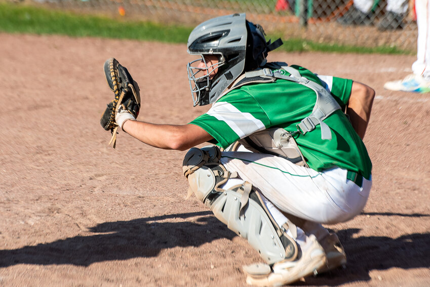 Tucker Stiles ducking an errant pitch against Pacelli on May 12.