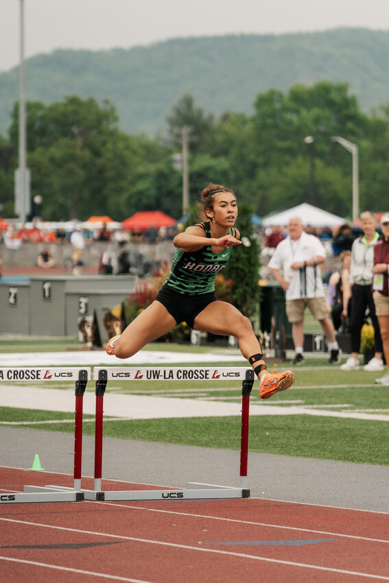 Aila Bergman took 4th place in the 300 meter hurdles at the state track meeting in La Crosse. Bergman set a new school record in her final race at this year's state meet.