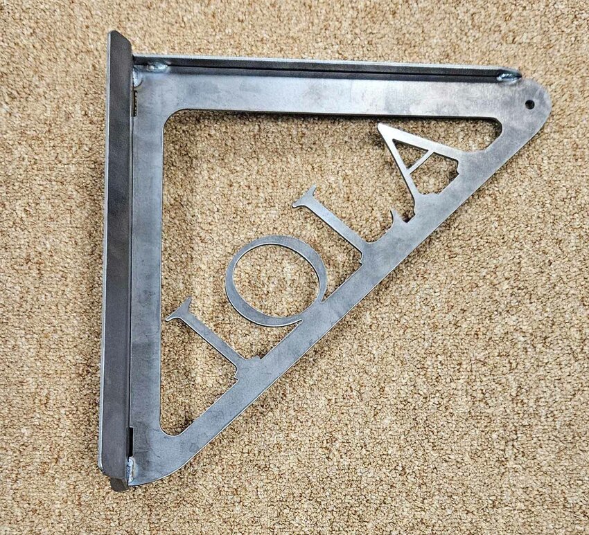 This bracket was recently purchased by the Iola Revitalization Committee to for hanging flower baskets in downtown Iola. It was created by KSF Metal Works.
Submitted Photo