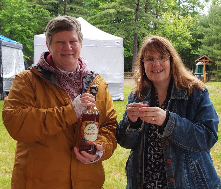 WALK IN THE WOODS — Despite dreary, chilly conditions, vendors, artisans and crafters were able to display their unique goodies at the 18th annual Walk in the Woods Art Fair in St. Germain last weekend.