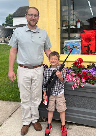 Pictured are, Kevin Painter (winner of the .22) and his father Brandon.