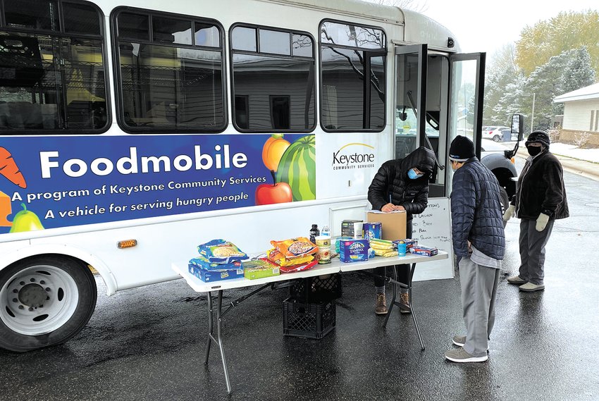 The two Foodmobiles make multiple stops in St. Paul each week, offering food choices. Find the schedule at keystoneservices.org. (Photo by Logan Murphy)