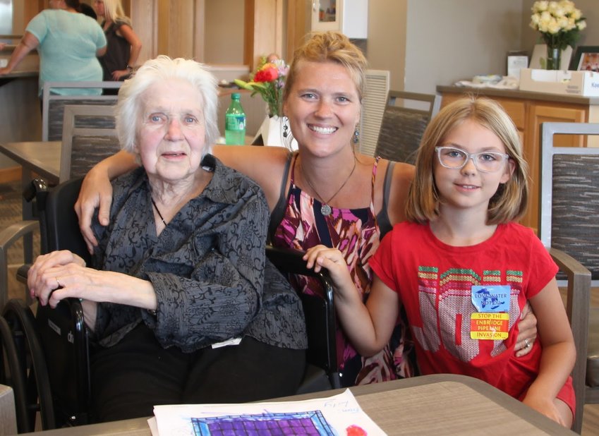 Delia Kathleen Christensen with her granddaughter, Tesha M. Christensen (owner of the Monitor), and great-granddaughter Joselyn.