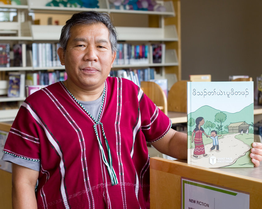 Thay Sai Htoo is one of five local writers who contributed to a book recently published by the Saint Paul Public Library called &ldquo;Children&rsquo;s Stories.&rdquo; The book adds to the body of literature available in the S&rsquo;gaw Karen language. (Photo by Margie O&rsquo;Loughlin)