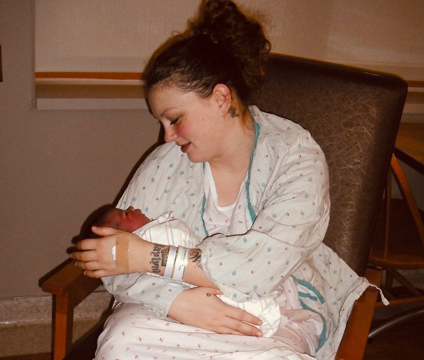 Brittany Seaver holds her newly born infant. She used the doula services in 2011 when the program was quite new, and is now a doula herself.    &ldquo;You have no choice of where you go or how much medical care you receive. You feel like   you are not   heard or   respected,&rdquo;  said Seaver.  (Photo submitted)