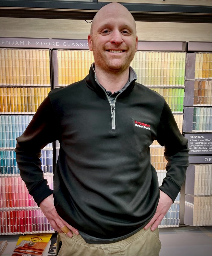 Luke Kabat is the assistant manager at Frattallone&rsquo;s Como Avenue store, one of their many Twin Cities locations. Local stores carry items that can keep folks warmer this winter. (Photo by Susan Schaefer)