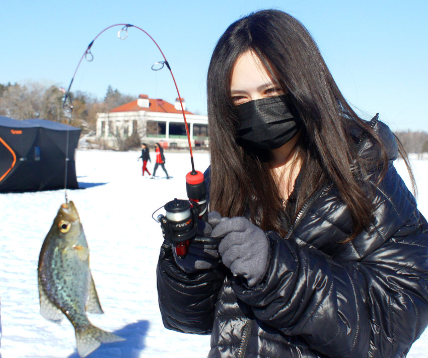 Vanessa Jesci caught one of the larger fish. Winters can be frigid in Minnesota, but Karl Erickson, the woodworking program manager at Elpis Enterprises (2161 University Ave.) can find ways to make the cold weather both fun and a learning experience. The Elpis ice fishing program is open to youth from fourth grade and up at area schools. They learn how to identify species, as well as fishing regulations and cold weather conditions. &ldquo;They are taught heater safety, hook safety and hole safety,&rdquo; Erickson said. Sixth-graders from Sejong Academy experienced ice fishing on Lake Como on Feb.13, 2023. Vanessa Jesci caught one of the larger fish (above). Police cadets from the St. Paul Police Activities League assisted students at Como Lake.&nbsp;&nbsp;