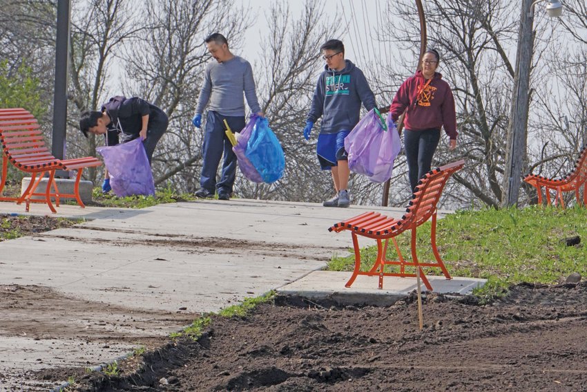 Volunteers clean up Frogtown Park &amp; Farm during a previous year event. This year&rsquo;s event will be on Saturday, April 22 from 9 to 11:30 a.m. (Photo submitted)