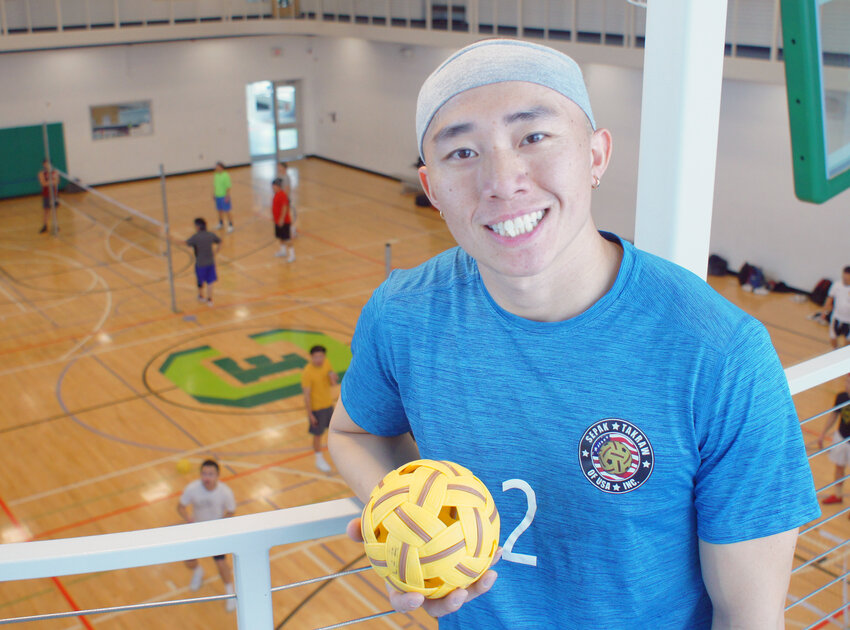Ker Cha, one of the team members that went to South Korea, practices at Frogtown Community Center.