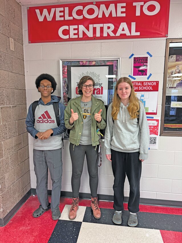 Zeyd Abdullahi (left) and Lucia Bodling (right) were part of the Right Track internship program through the city of St. Paul in spring 2024. They focused on journalism with the Monitor. Overseeing it at the school was 2023-2024 Work Based Learning Coordinator Emily Punyko (center).