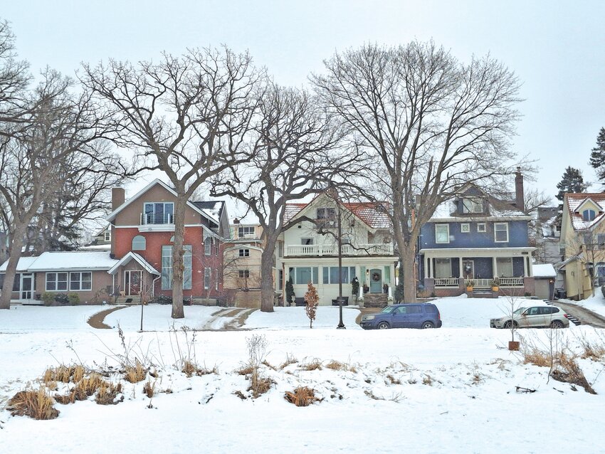 Sid Triantafilou of Greco Linden Hills Painting paints houses in residential neighborhoods, including East Isles, near Lake of the Isles. (Photo by Lulu Jaeckel)