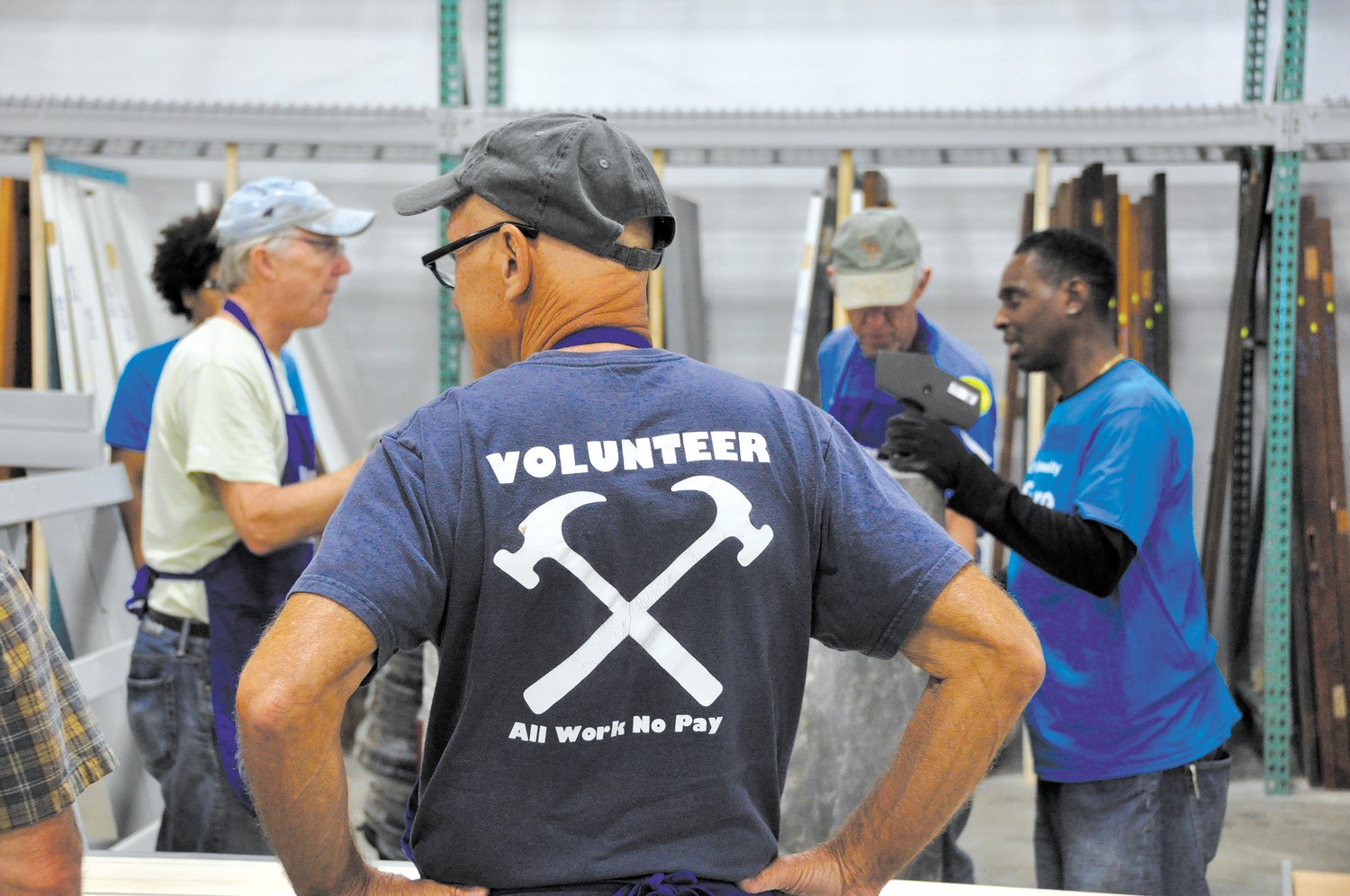 Volunteers assist staff at the ReStore locations. (Photo submitted)