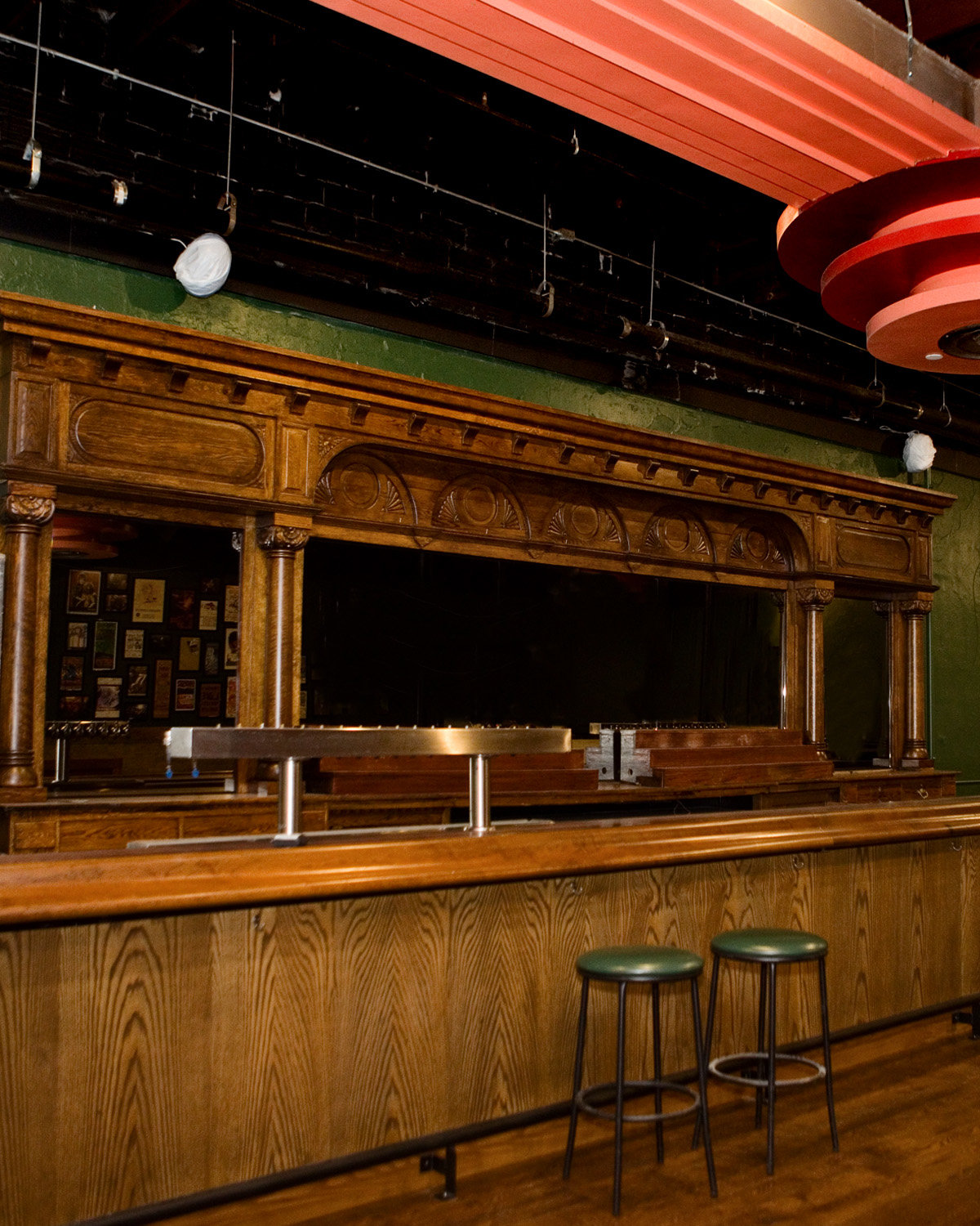 The interior, including the historic wooden bar at the Turf Club (at right) has been restored following fire damage in May 2020. (Photo by Margie O’Loughlin)