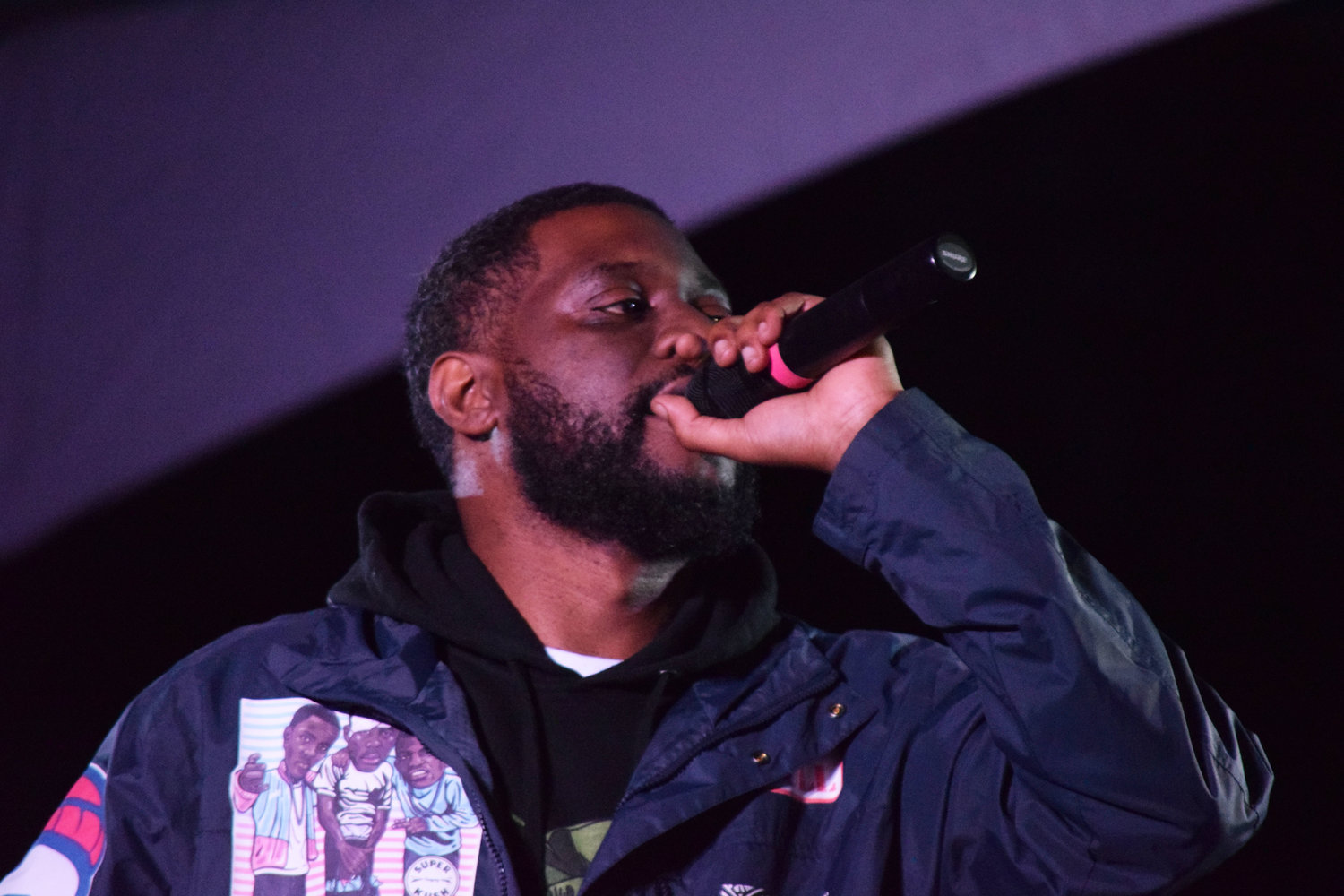 “Rest in peace, George Floyd,” Twin Cities rapper Metasota tells the crowd, “I don’t care what you believe personally. I don’t care how you grew up. No one deserves to die like that.” (Photo by Jill Boogren)