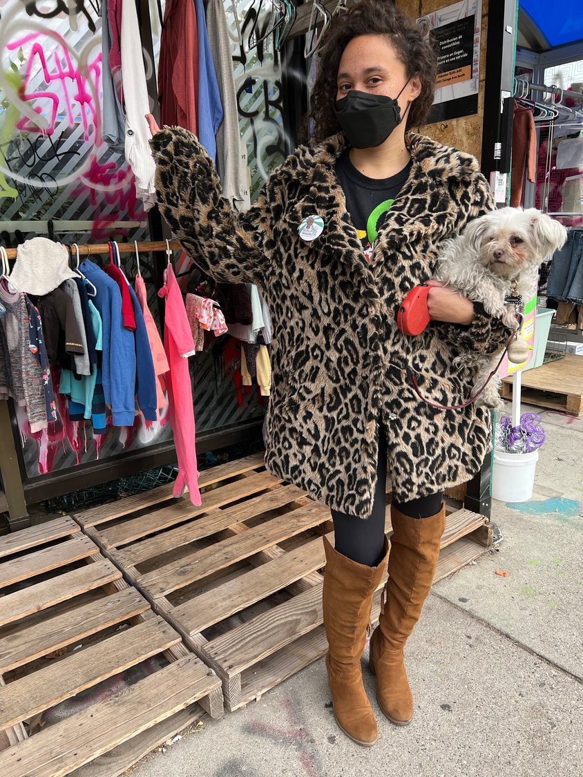 Jennie Leenay, GFS community member and caretaker of The People’s Closet, with their pup Joyoncé. It's important to Leenay that fashion reaches everyday people, and that people feel connected to themselves and their community.  (Photo by Jill Boogren)