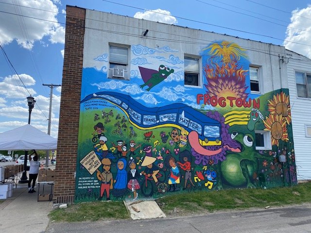 A mural next to the Cash Money Ryders Motorcycle Club