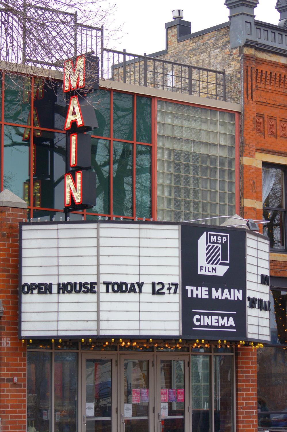 The concessions counter at the theater on 115 SE Main was remodeled. New carpeting was installed on the stair to the second floor, and the second-floor concession stand was removed. The old bulb-illuminated exterior “Main” sign remained, but the marquee below has been remodeled to include the MPS Film Society name. (Photo by Terry Faust)