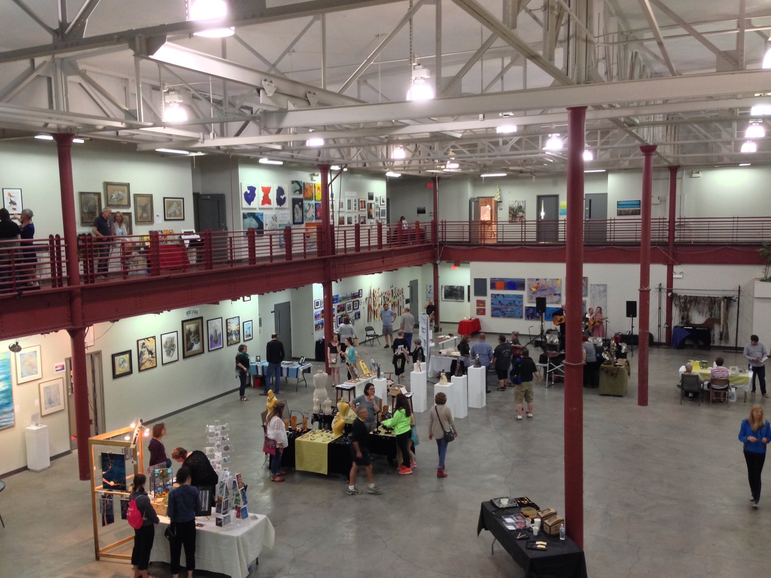 Crowds flock the two-story Grain Belt Warehouse during Art-A-Whirl 2016. (Photo by Susan Schaefer)