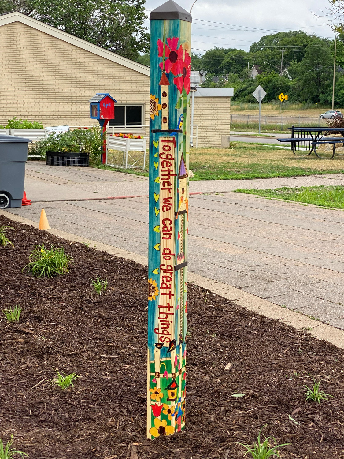 The peace pole at St. Peter Claver Catholic School.