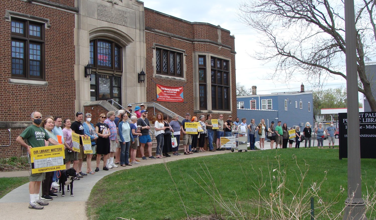 Citizens rally outside the Hamline Midway Library to express support for saving the historic building on Tuesday, July 19, 2022. (Photo submitted)