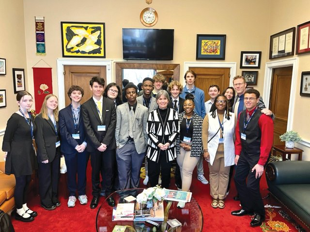 Como AP Government students with Congresswoman Betty McCollum in her Washington D.C. office. (Photo courtesy of congressional staff)