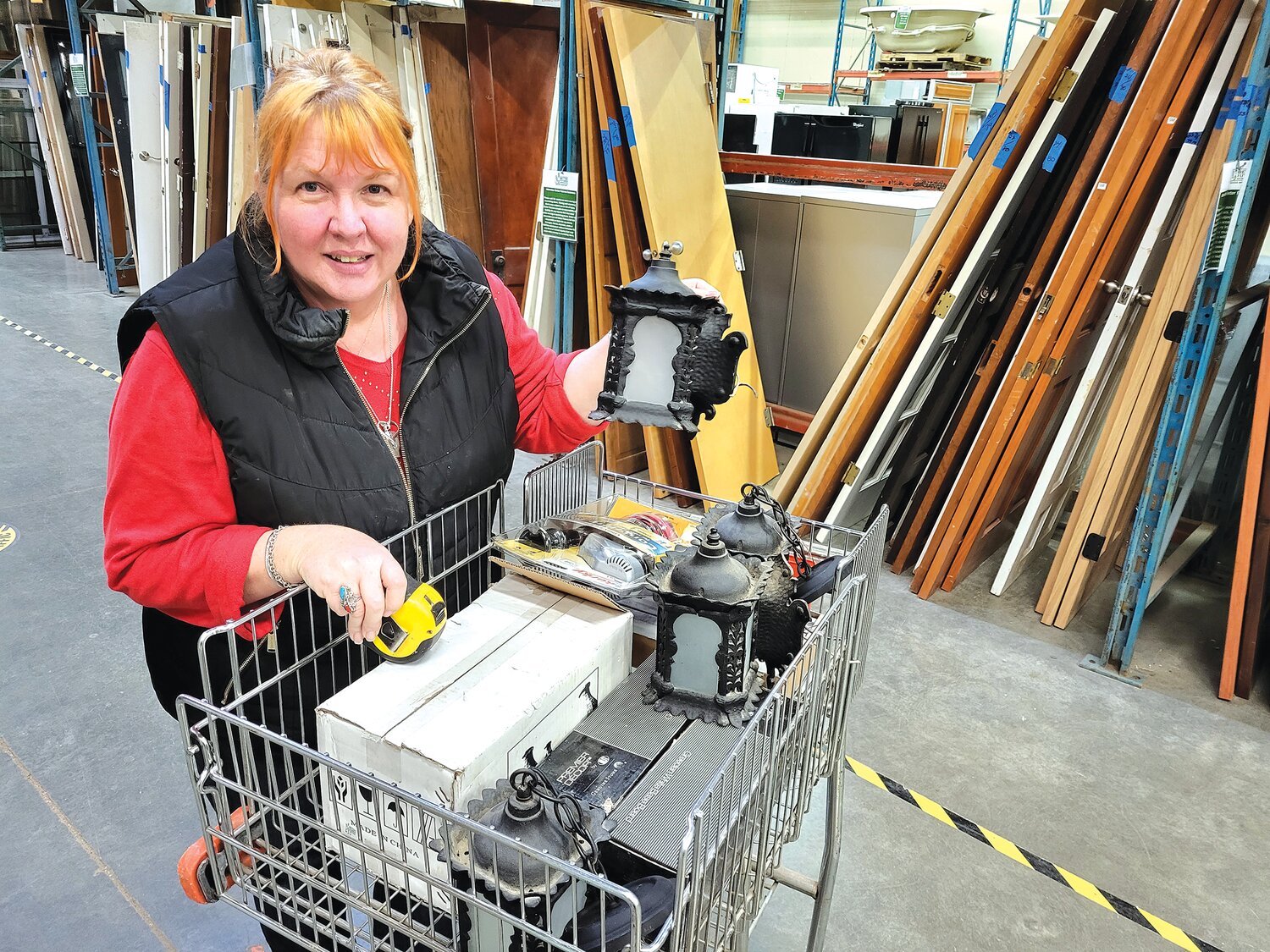 Diane Schray, a real estate agent with Real Estate Masters, shopped on April 28 at the ReUse Warehouse, scoring vintage fixtures for a client who recently bought a tudor-style house in Como neighborhood. The clerk remarked that they had just come in that day.