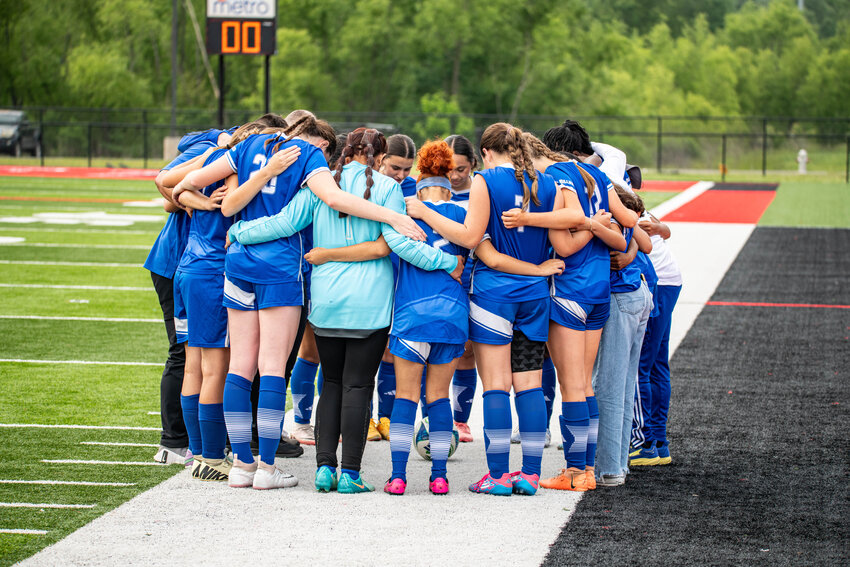 THE LADY BILLIES gather before the start of their 4A State Tournament contest with Magnolia. The 2025 Lady Billies finished the season with a 10-3-1 record and a Conference Championship.