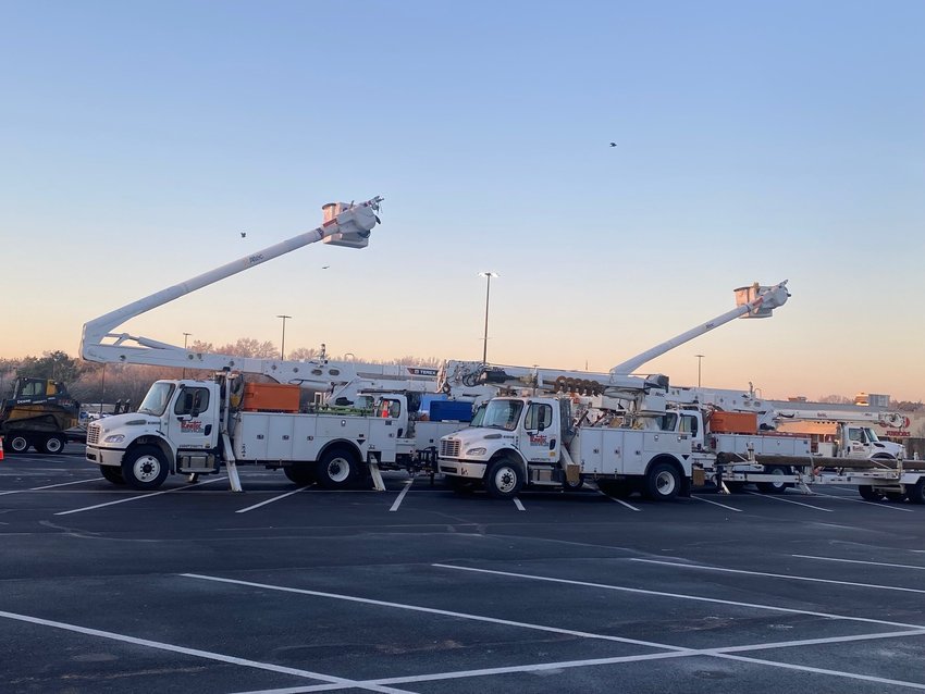 Utility contractors staged in several parking lots in the area last week to assist in power restoration.
