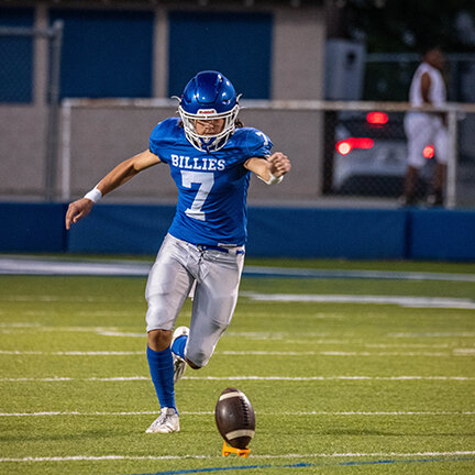 JUDE PARKE kicks the ball off on Thursday to begin the Junior Billies contest against the Junior Bobcats from Dumas.