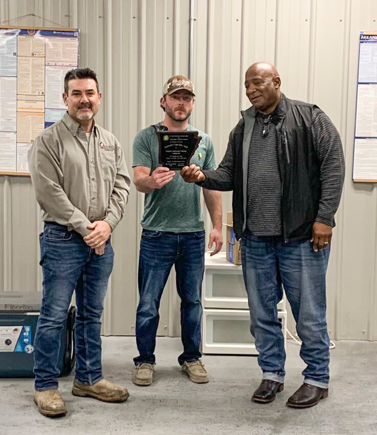 Recipients of the award (from left to right) Shay Dugal, owner of Ouachita Hardwood Flooring, Josh Smith, Production Manager, and presenting the award was Mr. Ricky Geigger, Safety Consultant.