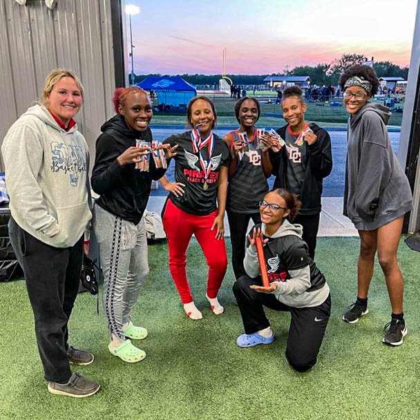 LADY PIRATE TRACK TEAM shows off their medals after the 2022 State Track Meet. The seven members of the Lady Pirates all qualified for the State Meet.