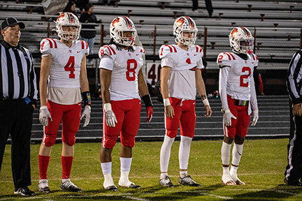 PIRATE CAPTAINS: Luke Phillips (4), Brayden MIllett (8), Kade Bodiford (1), and Tramond MIller (2) represented the Drew Central Pirates as the game captains for the 3A State Football Championship first round game against Prescott.