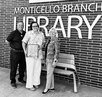 In the photo from left are Doug Owens , currently of Louisiana, Shannon Rodriguez, Manager of the Monticello Branch Library, and Anne Walker, currently of Missouri.