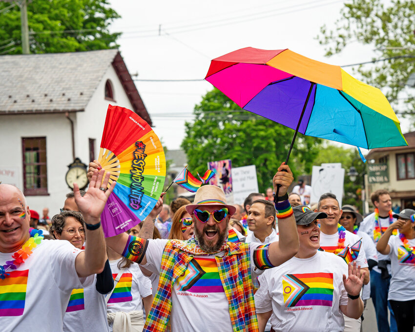 Pictured is Johnson & Johnson’s LGBTQ+ employee resource group, Open & Out, marching in 2024’s Pride Parade.