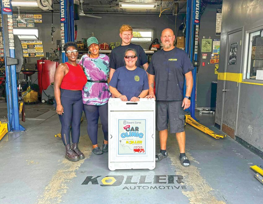 Haven Liegel and Krystle Lee (left), recipients of the Car Clinic program share their gratitude with Stephanie Sauers Boyd (center), Executive Director of Drive And Thrive, along with Nick Kollar and Rob Kollar (right) of Kollar Automotive for their generous support.