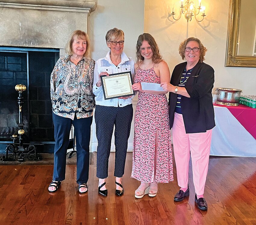 Tamara Kohmann (second from the right) receives certificate of recognition from Scholarship Committee members (from left) Judy Lopacki, Barb Colbert, and Marcia Gutowicz, MD.