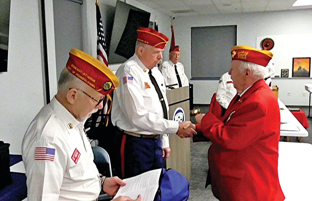 District 2 Vice Commandant Gene Irvin (R) presents the gavel and congratulates Commandant Mike Clark.